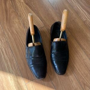 black leather slip-on men Bally shoes, plus original wooden shoe trees. 9 1/2 E